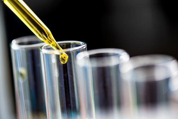 Using dropper sampling oil or chemical liquid drop to test tube